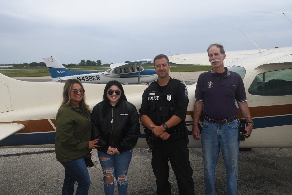 Sonia Ramos, Yesenia Guereca, Officer Andrew Simon, and pilot Jim Hantschel